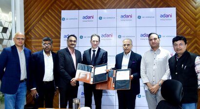 Johan Bindele (GE Vernova) with Anil Sardana (AESL) and team. Courtesy of AESL.