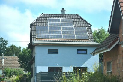 Rooftop solar panels on a French home. Courtesy of Daniele La Rosa Messina/Unsplash.
