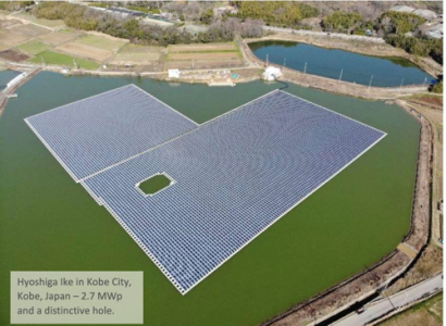 Japanese contractors install solar panels on the Public Works building roof  at Fleet Activities Sasebo, Japan