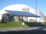 Tree-like solar panels for EV charging shelters