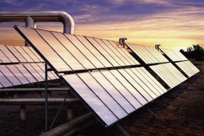 Capturing summer solar thermal output to ease winter